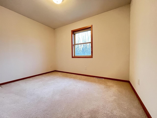 unfurnished room featuring carpet floors