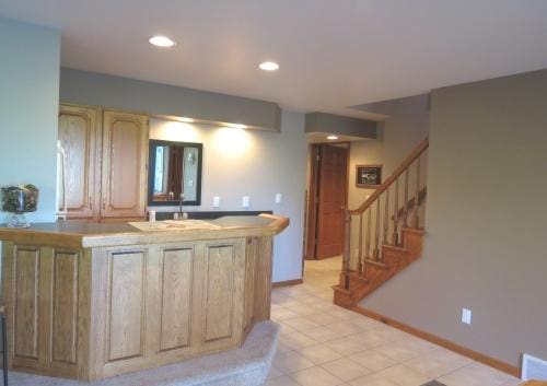 kitchen featuring light brown cabinetry