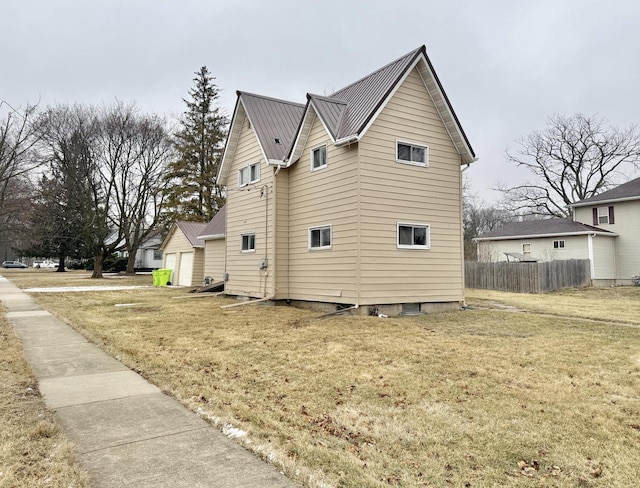 view of property exterior with a lawn