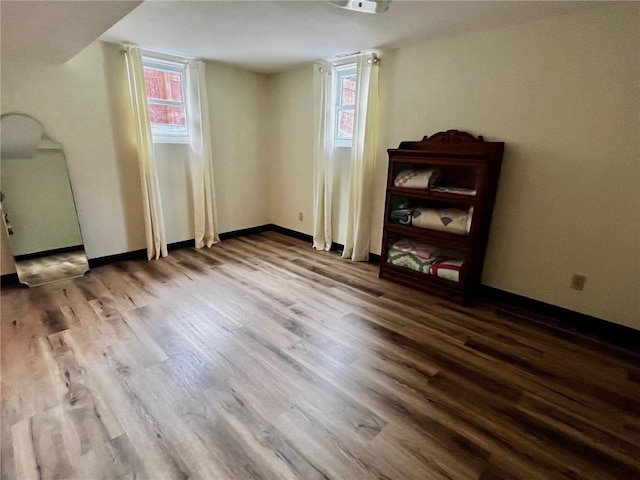 empty room featuring wood-type flooring