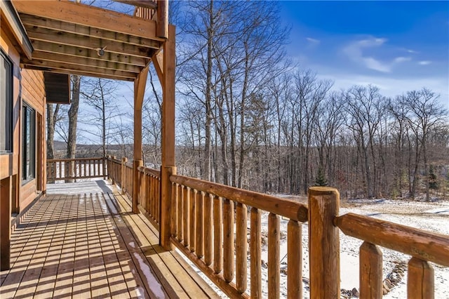 view of snow covered deck