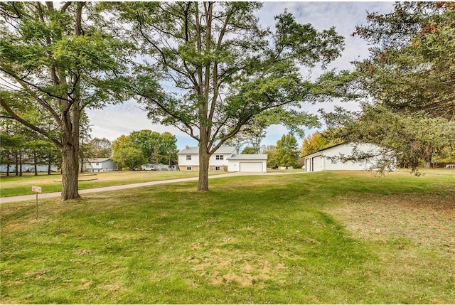 view of yard with a garage