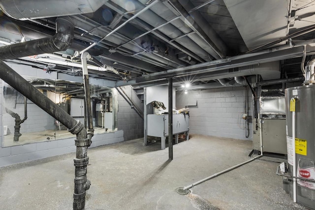 basement with gas water heater and electric panel