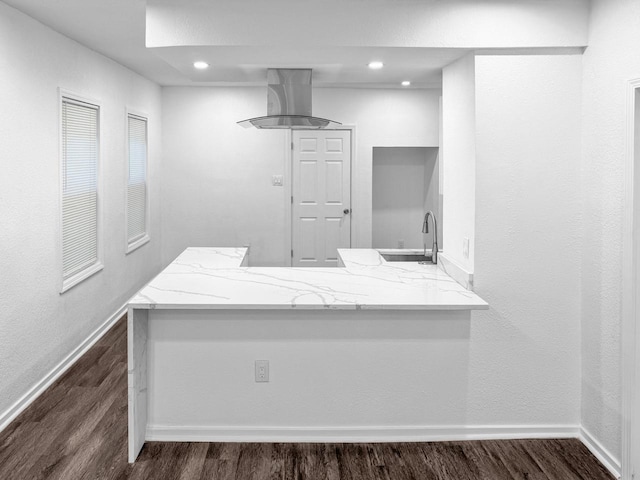 bathroom with wood-type flooring and sink