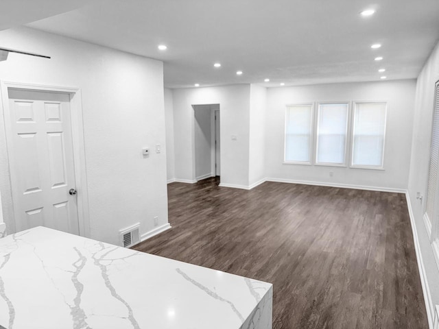 interior space featuring dark wood-type flooring