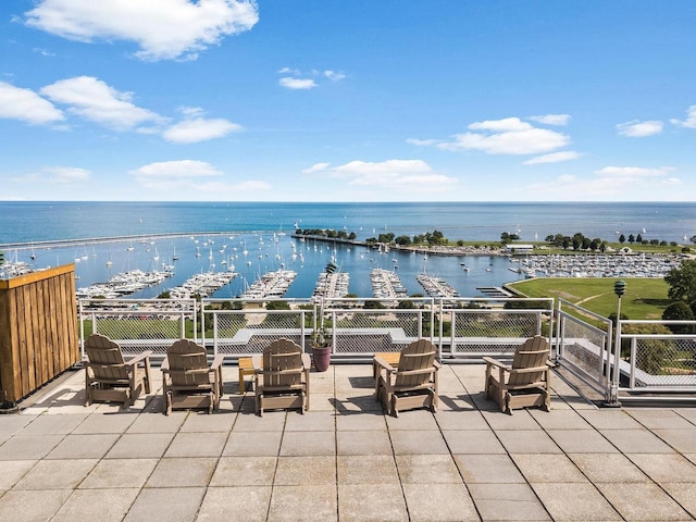 view of patio / terrace featuring a water view