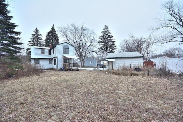 view of side of home featuring a deck