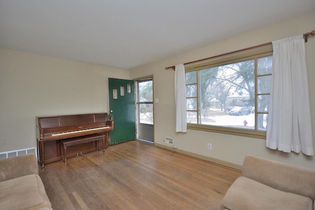 living area featuring hardwood / wood-style flooring