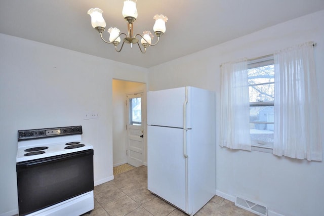 kitchen with light tile patterned floors, white appliances, an inviting chandelier, and pendant lighting