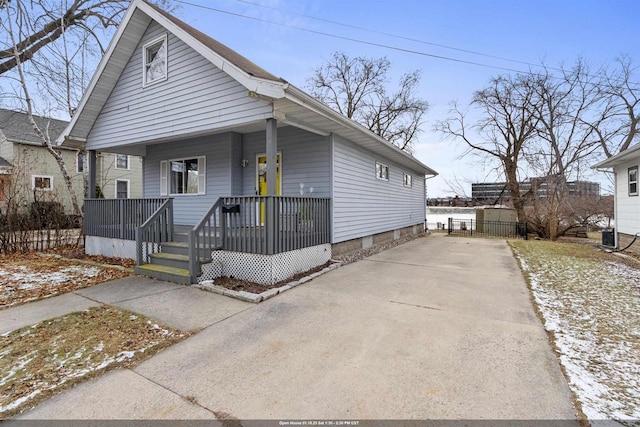 bungalow-style house featuring covered porch