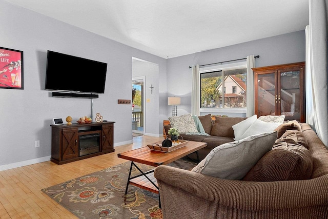 living room featuring light wood-type flooring