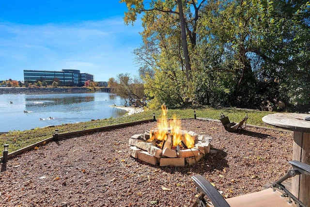 view of water feature featuring an outdoor fire pit