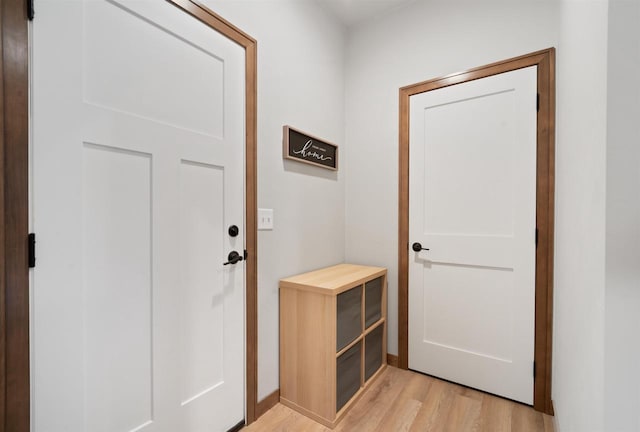 doorway to outside with light hardwood / wood-style flooring