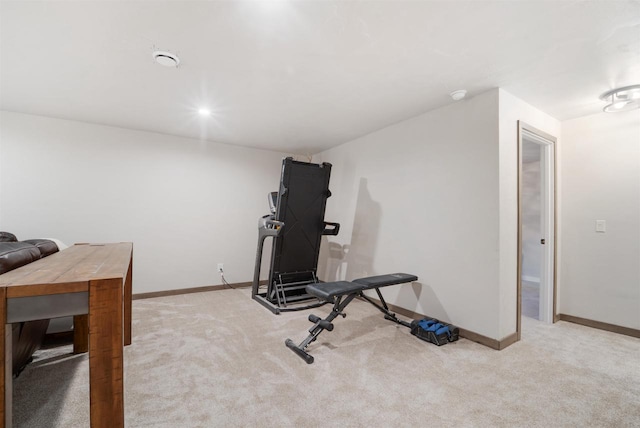 workout room with light carpet