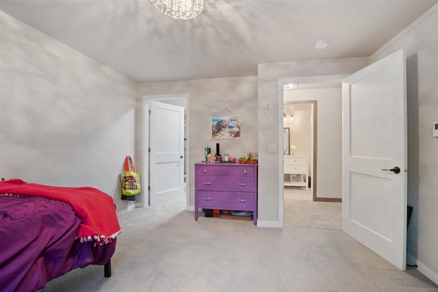 bedroom featuring light carpet