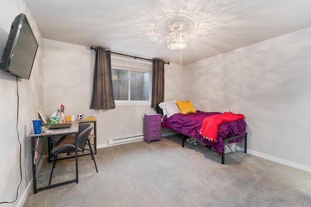 bedroom featuring carpet floors and a baseboard heating unit