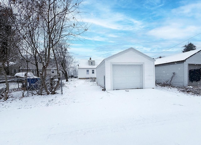 view of snow covered garage