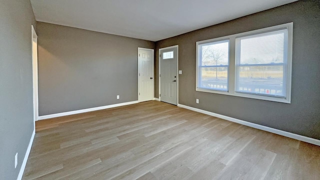 foyer entrance featuring light wood-type flooring