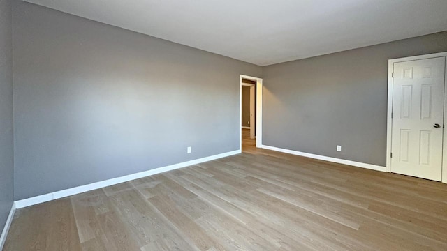 empty room featuring light hardwood / wood-style floors