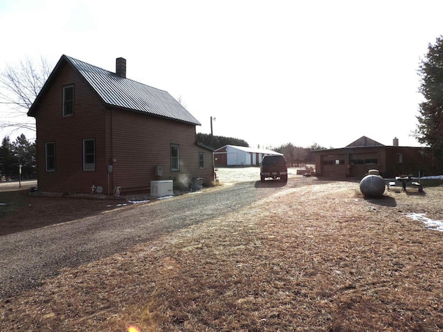 view of property exterior featuring cooling unit