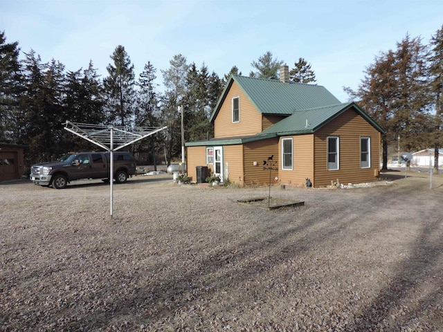 view of home's exterior featuring central AC