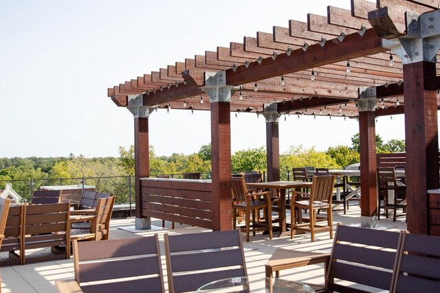 wooden deck featuring a pergola