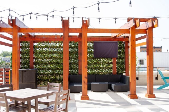 view of patio / terrace featuring an outdoor living space and a pergola