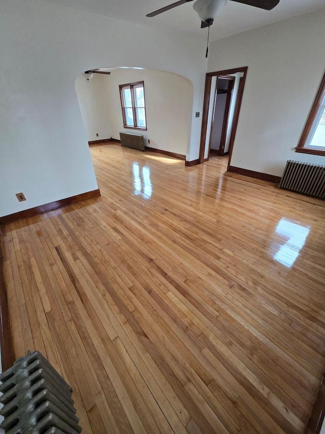 interior space featuring ceiling fan and light hardwood / wood-style flooring