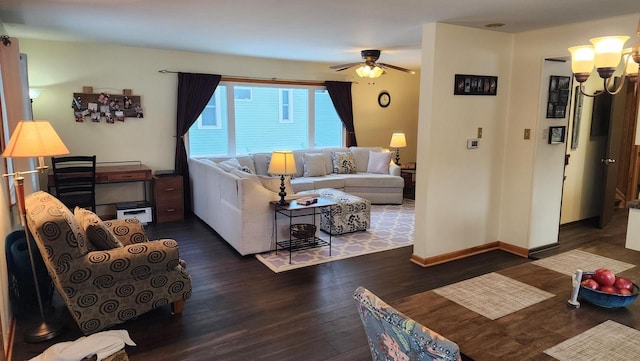 living room featuring ceiling fan and dark wood-type flooring