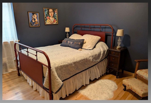 bedroom featuring light hardwood / wood-style floors