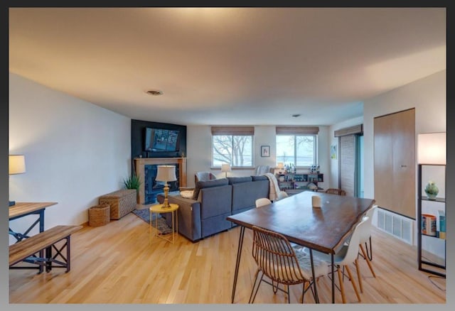 dining area with light hardwood / wood-style flooring