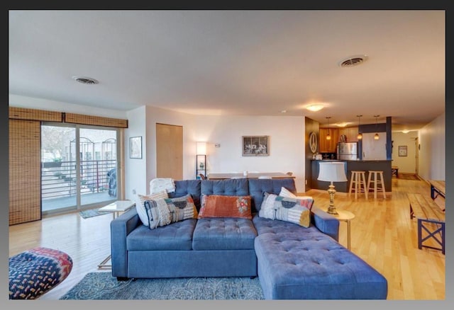 living room featuring light wood-type flooring