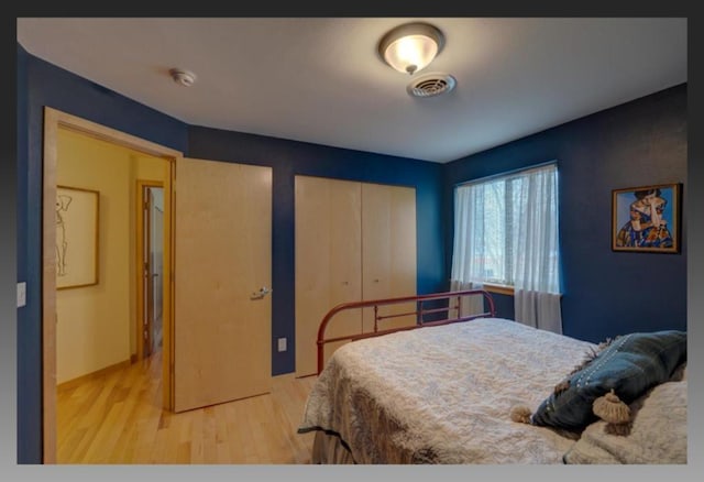 bedroom featuring hardwood / wood-style flooring