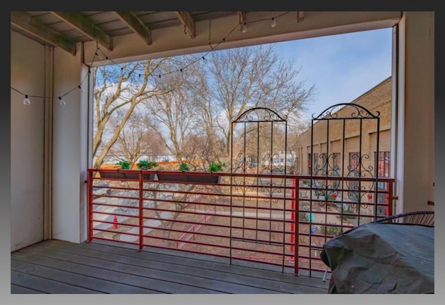 wooden deck with grilling area