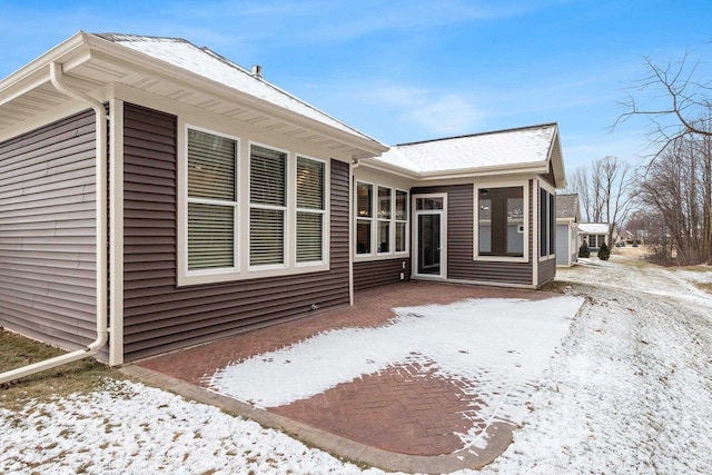 view of snow covered property