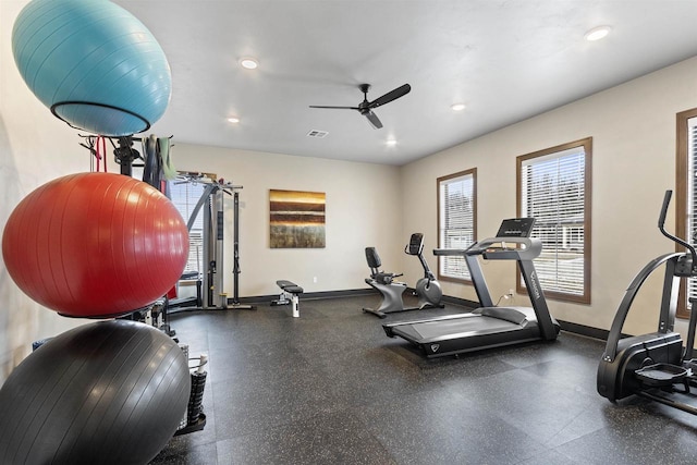 workout room featuring ceiling fan