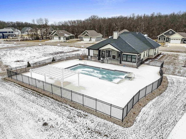 view of snow covered pool