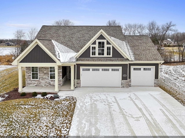 view of front facade with a porch and a garage