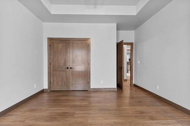 unfurnished bedroom with light hardwood / wood-style floors