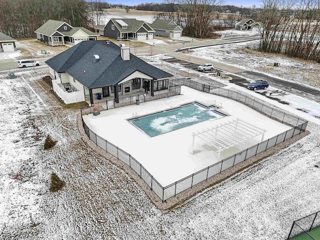 view of snow covered pool