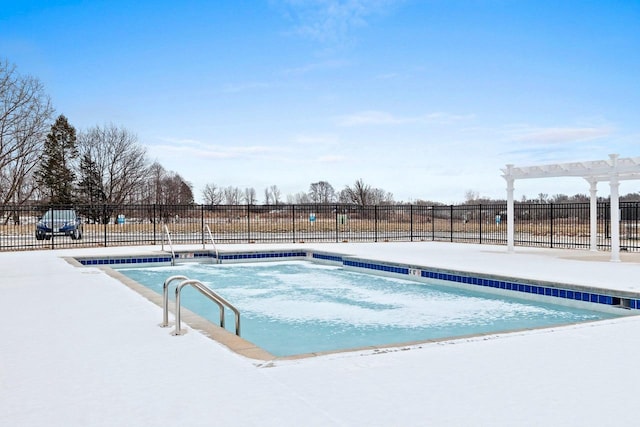 view of swimming pool with a pergola