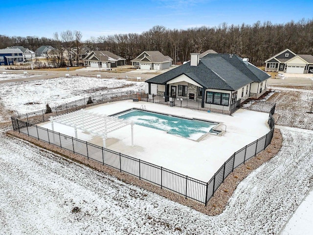 view of snow covered pool