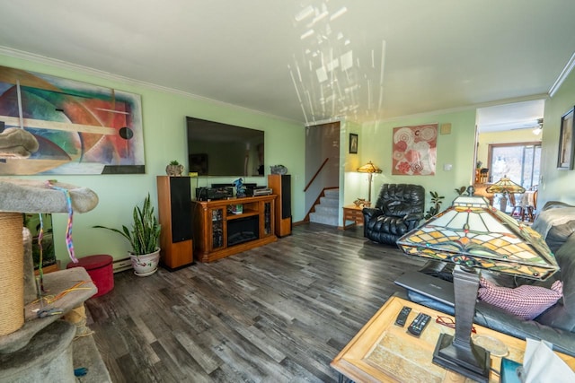 living room with dark hardwood / wood-style floors and crown molding