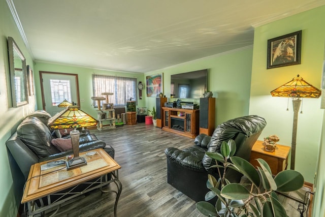 living room featuring crown molding and hardwood / wood-style floors