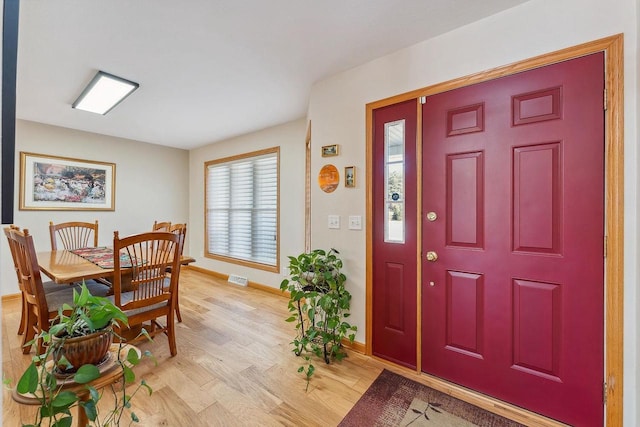 entrance foyer with light wood-type flooring