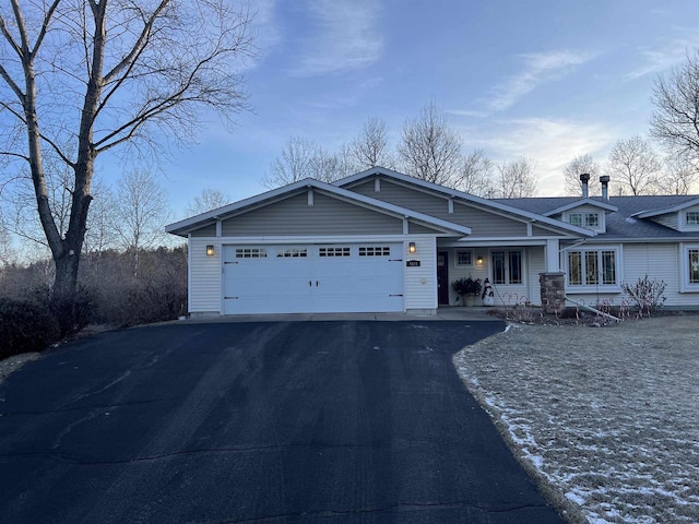 view of front of property with a garage