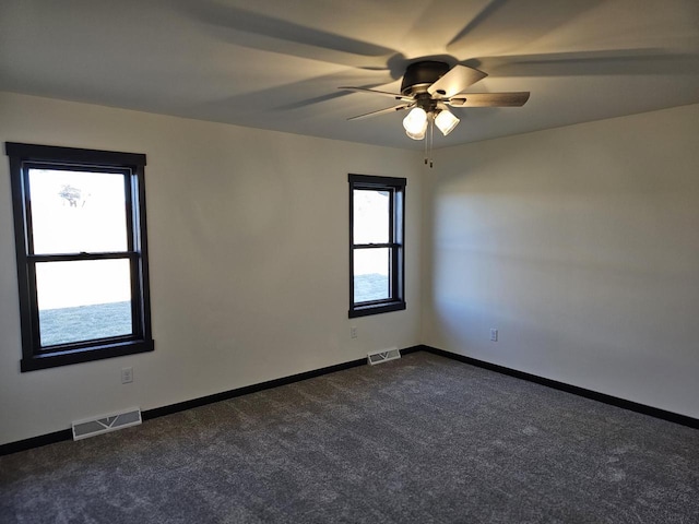 carpeted empty room with ceiling fan