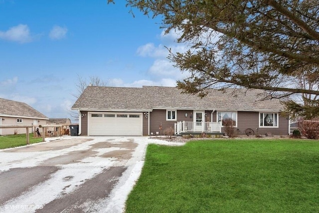 ranch-style home with a front lawn, a porch, and a garage