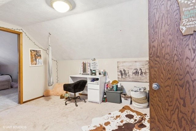 office area with light carpet and lofted ceiling