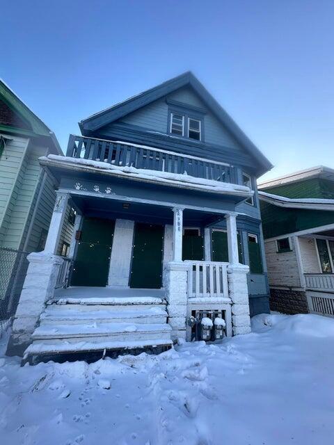 view of front of home featuring covered porch